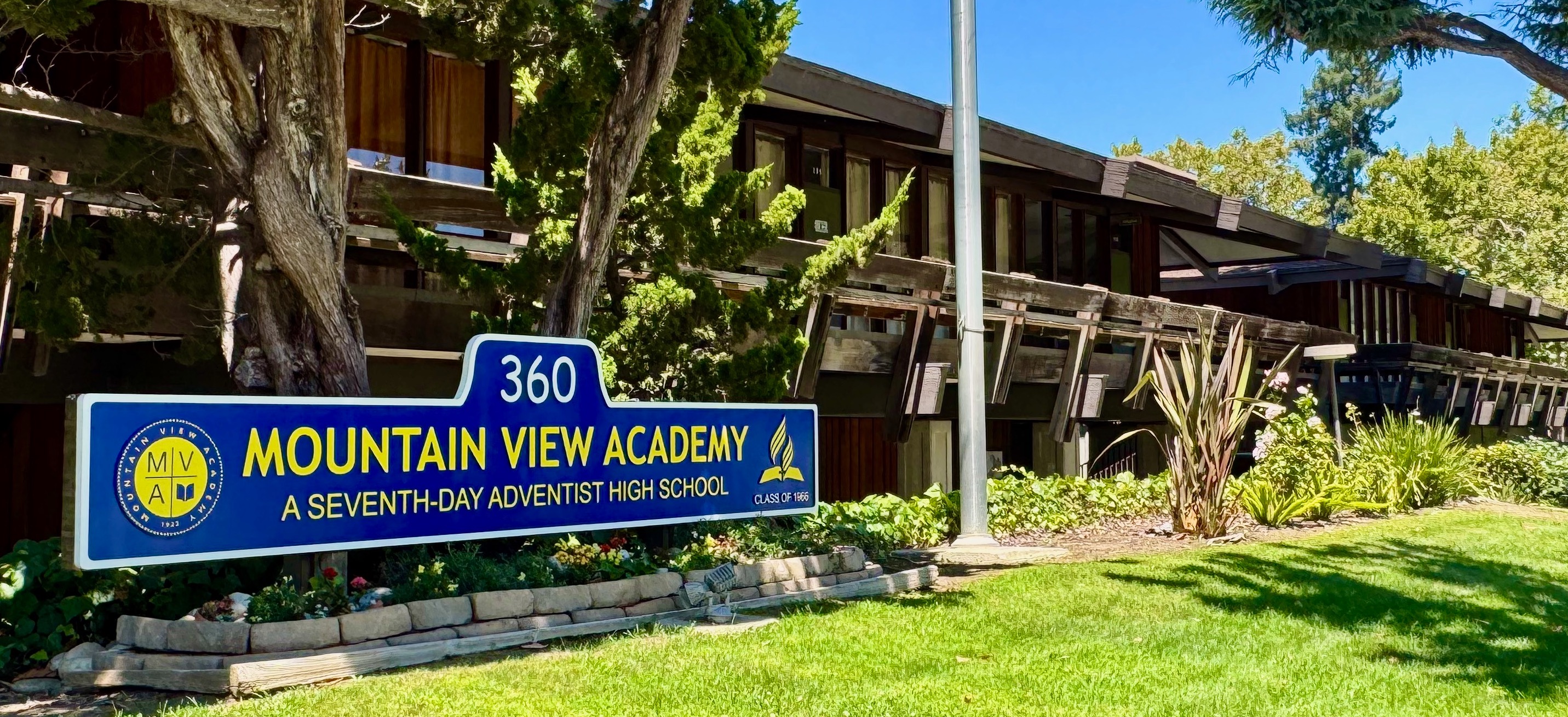 mountainview academy sign in front of building