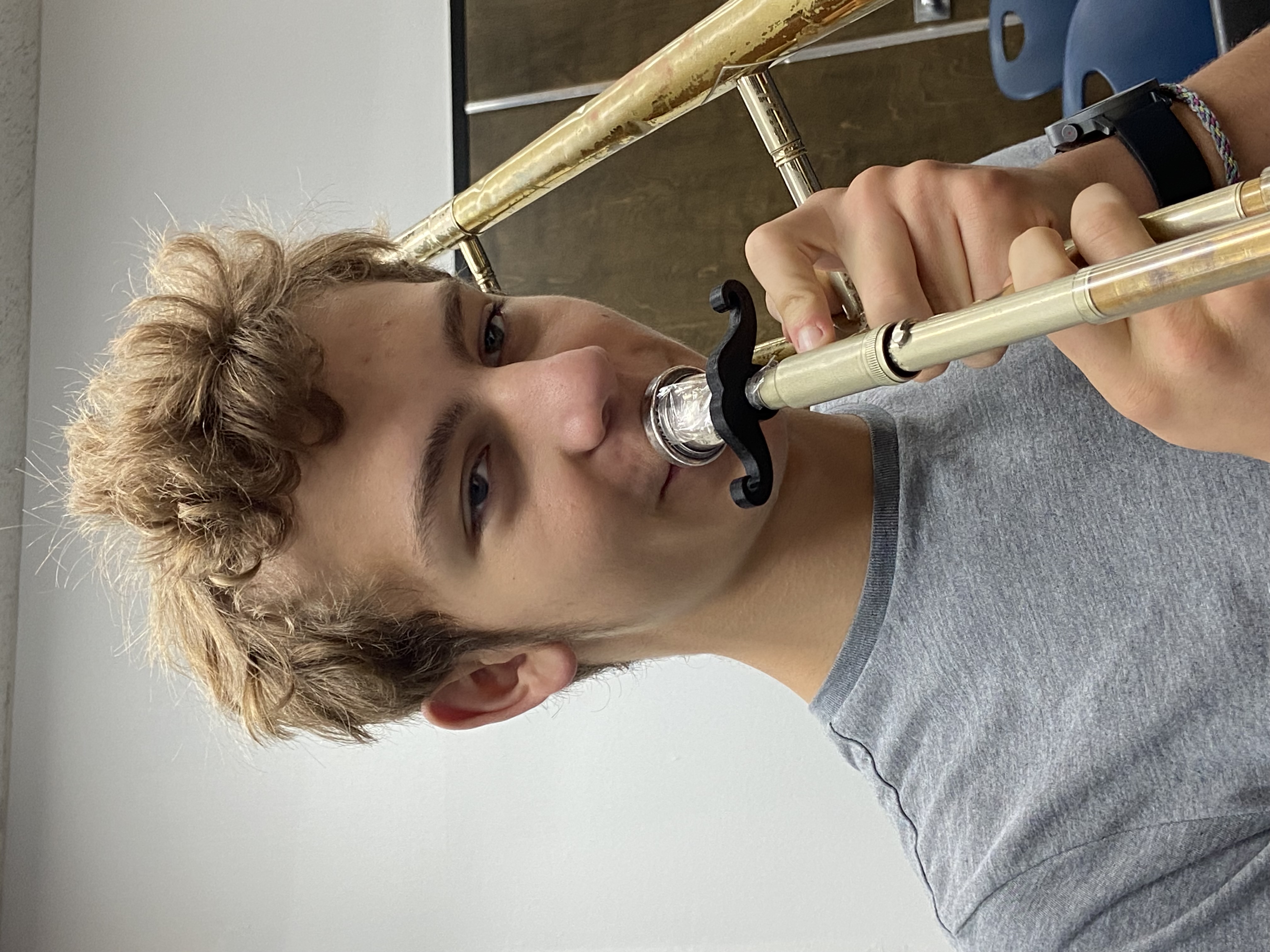 student with trombone