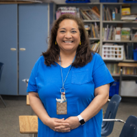 teacher happy at her classroom