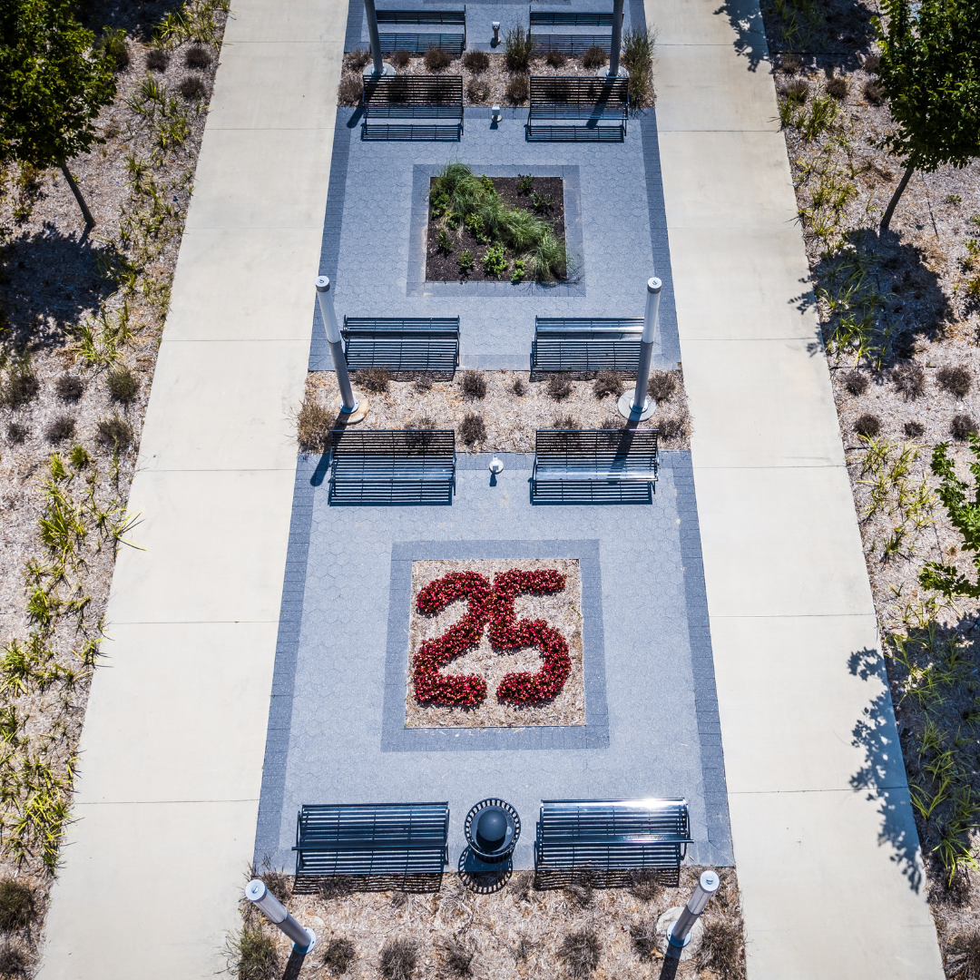 Aerial photo of flower bead in between benches in Heritage Plaza