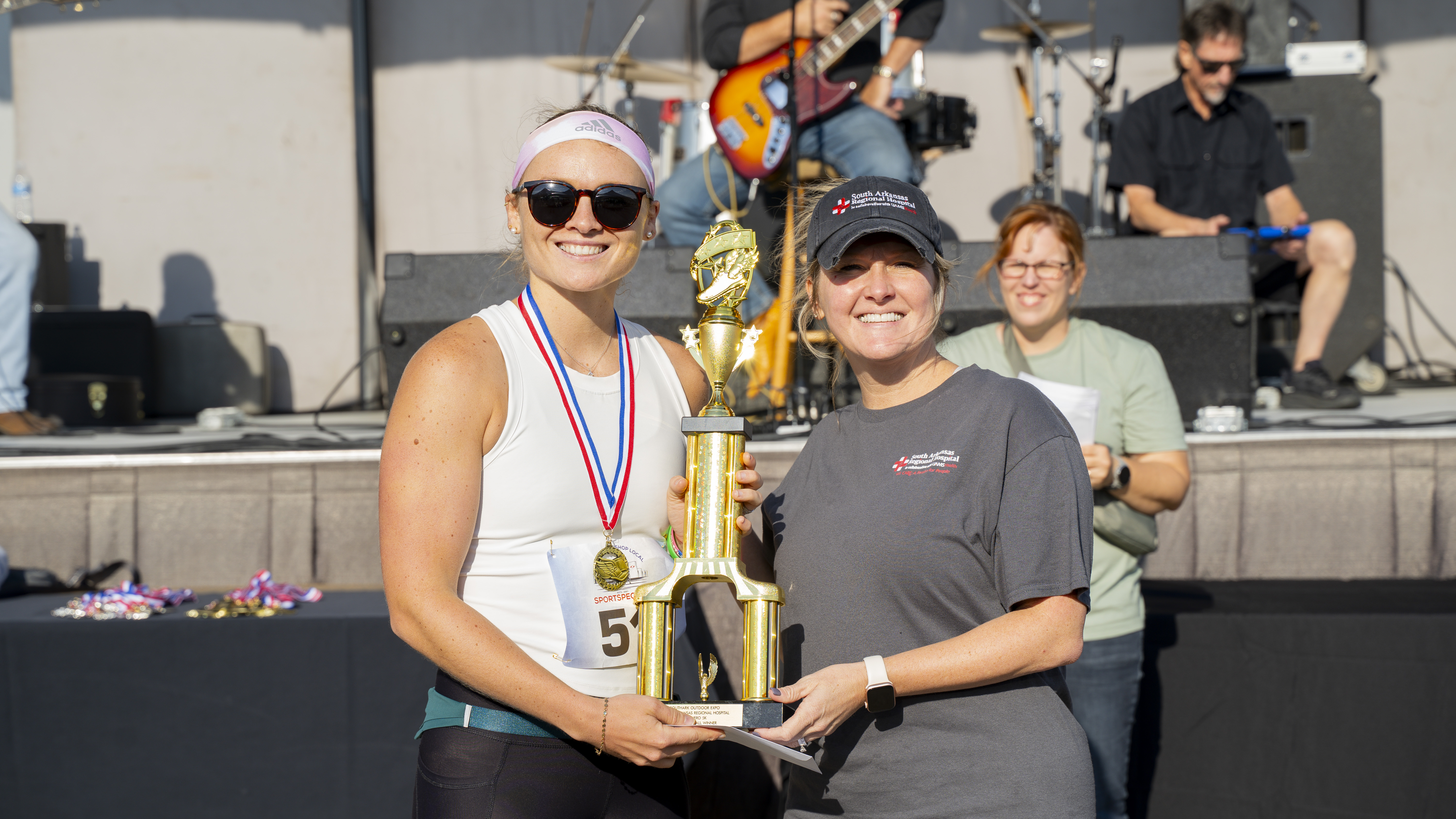 Photo of overall female winner of Hero 5k at 2024 Outdoor Expo