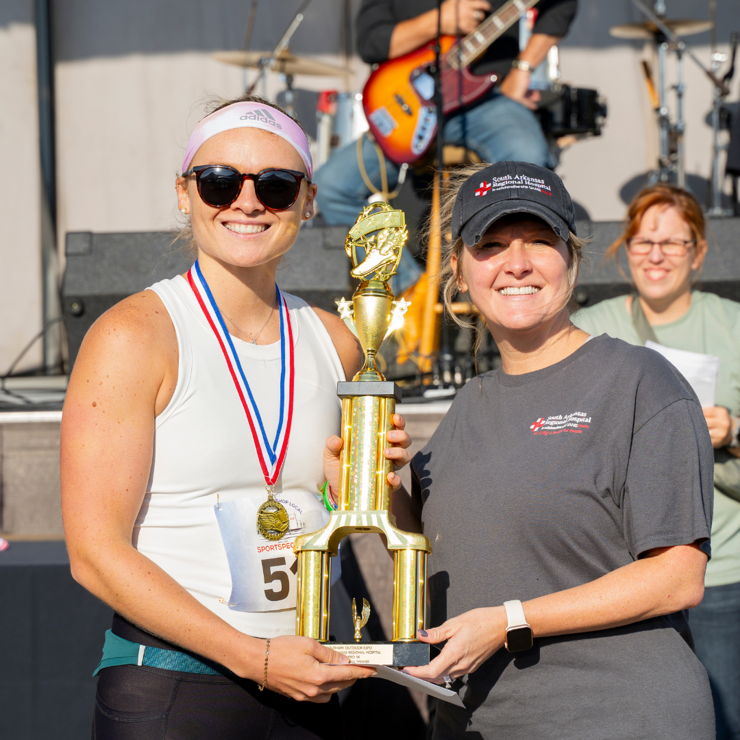 Photo of overall female winner of Hero 5k at 2024 Outdoor Expo