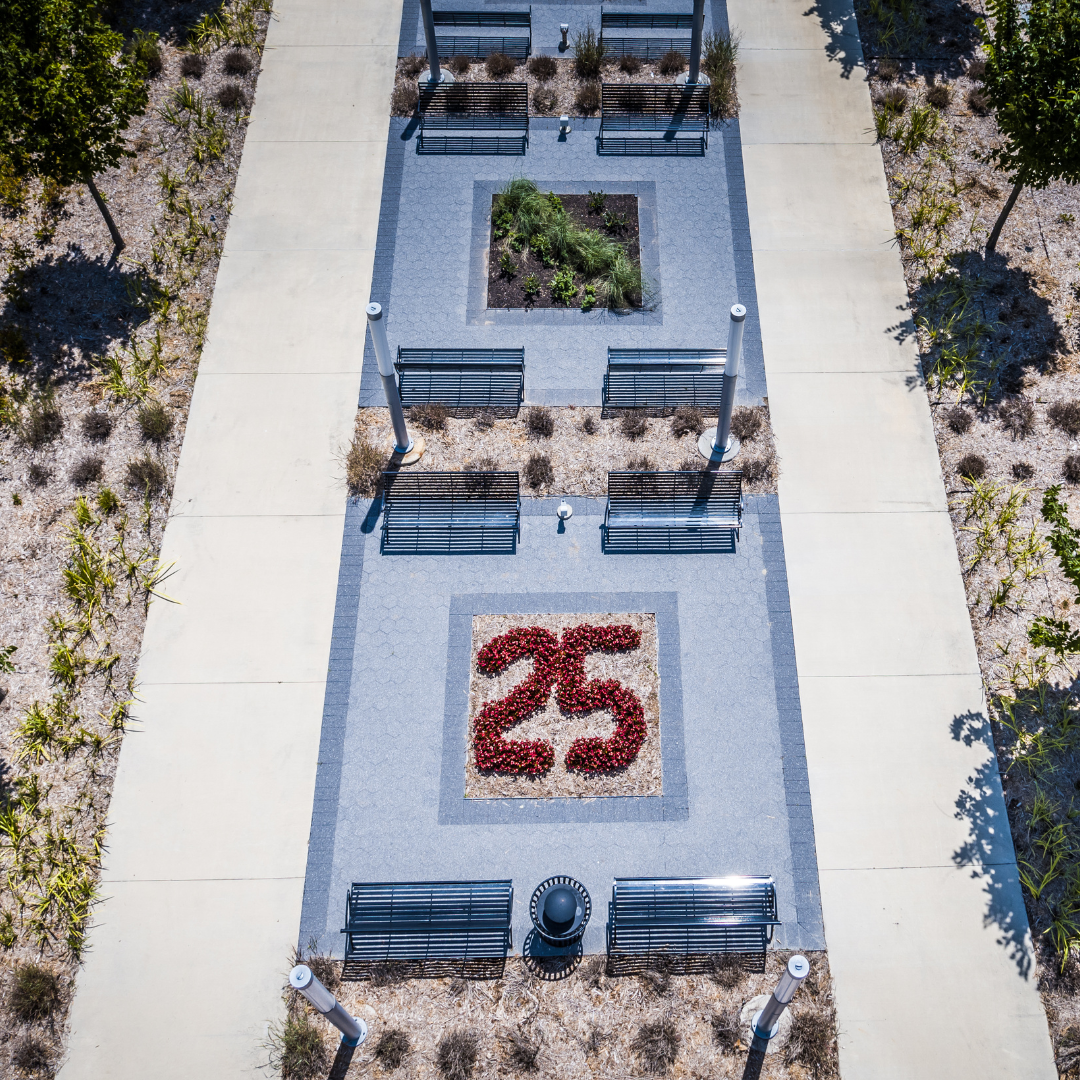 Aerial photo of flower bead in between benches in Heritage Plaza