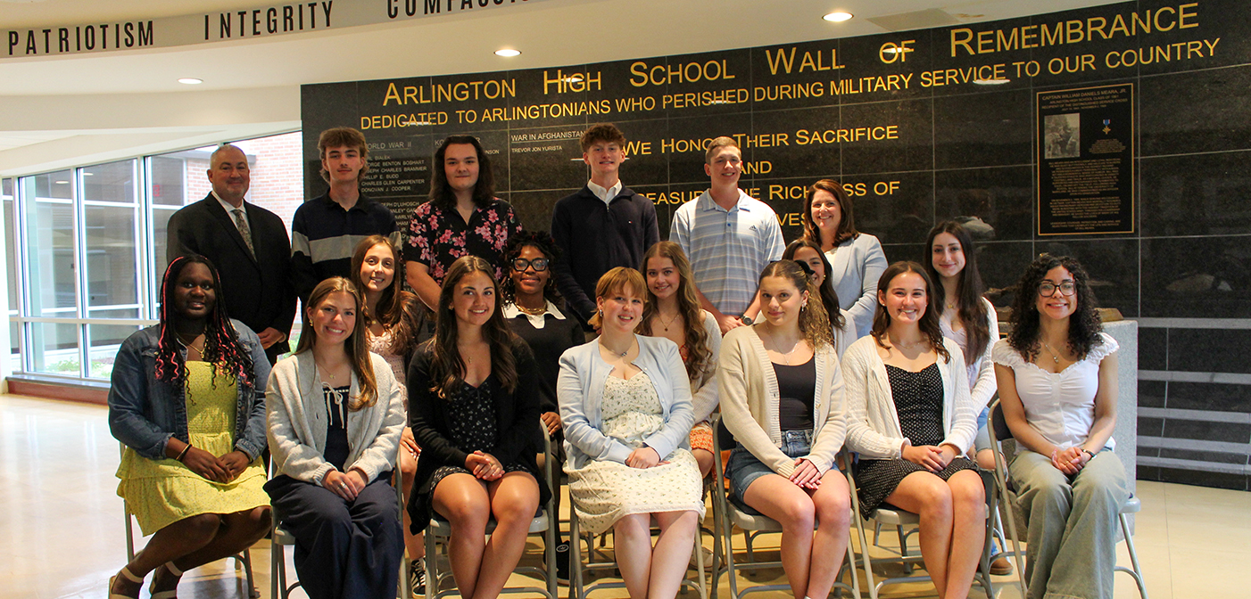Principal Michael Murphy with the 16 recipients of the Charlie Johnson award