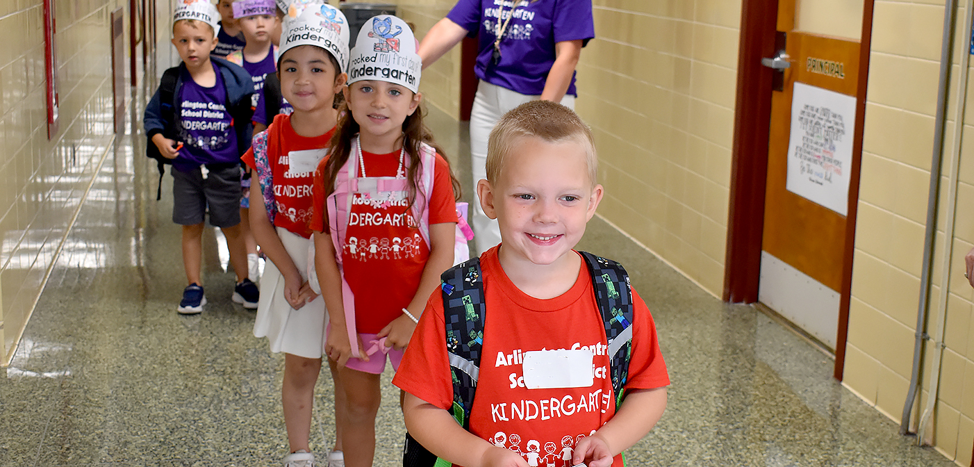 Kindergarten students walking in hall at Beekman Elementary