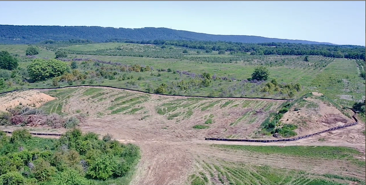 aerial image of mountain ridge primary construction site