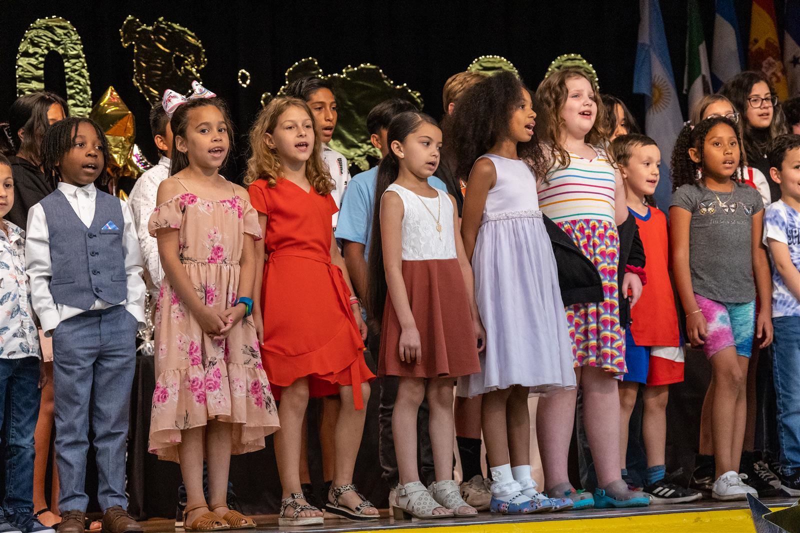 students on stage at the hispanic heritage contest