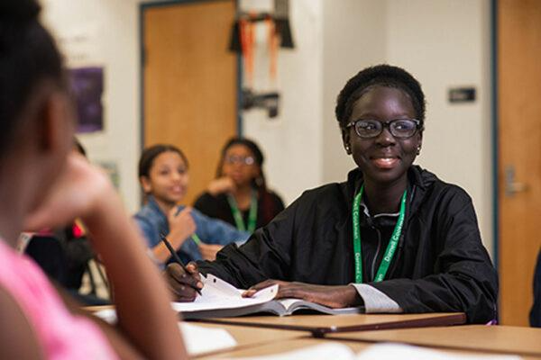 Girl student smiling in class