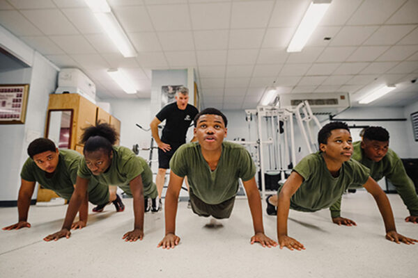 Military students doing pushups