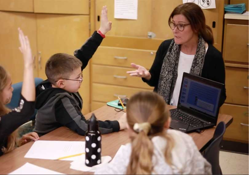 Students and teacher in class