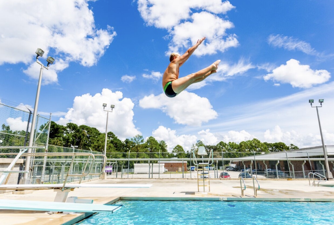 Student diving in a Duval County Public schools swimming pool