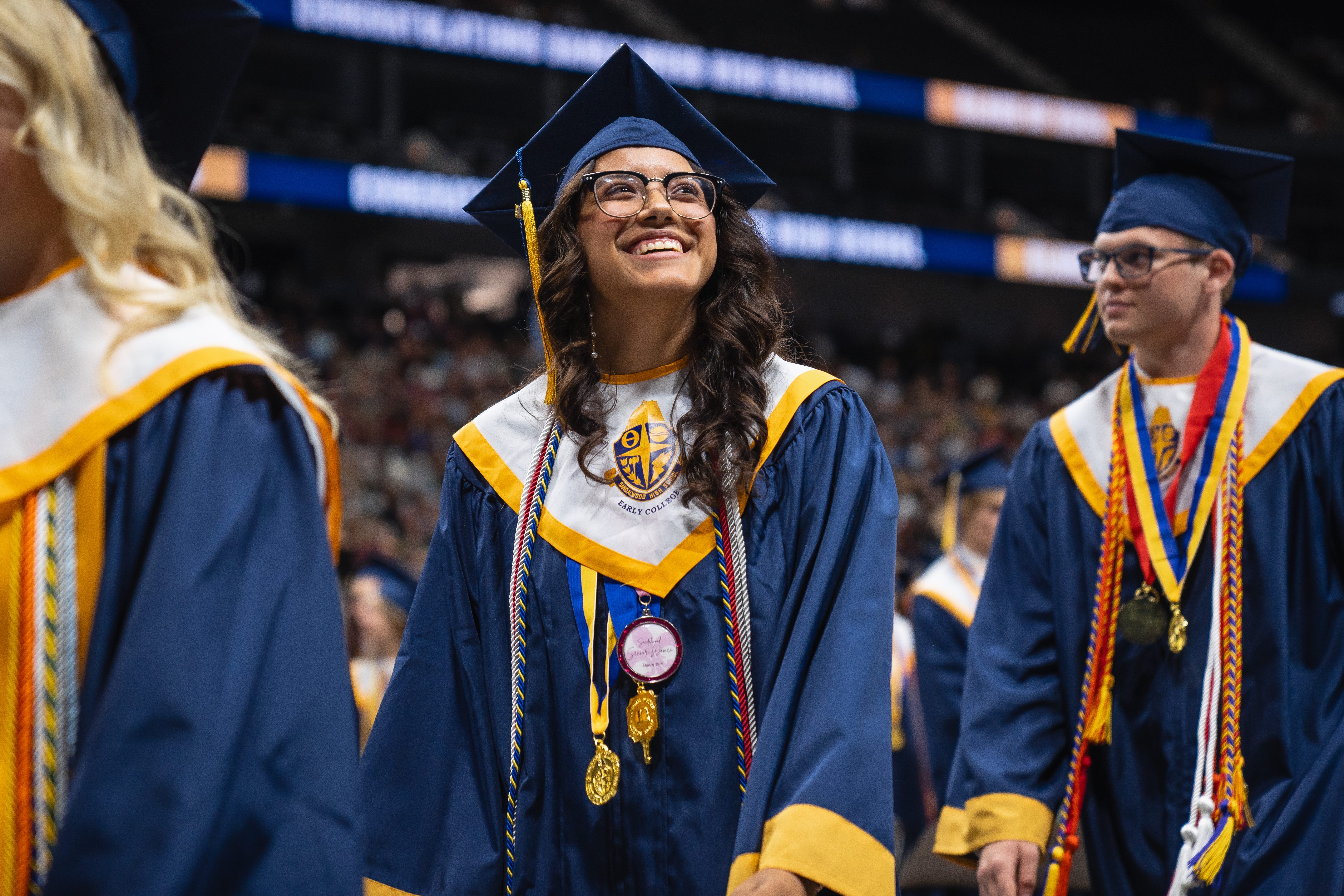 Sandalwood High School student smiling at her graduation ceremony