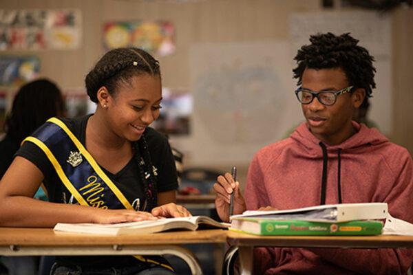 Students in class writing