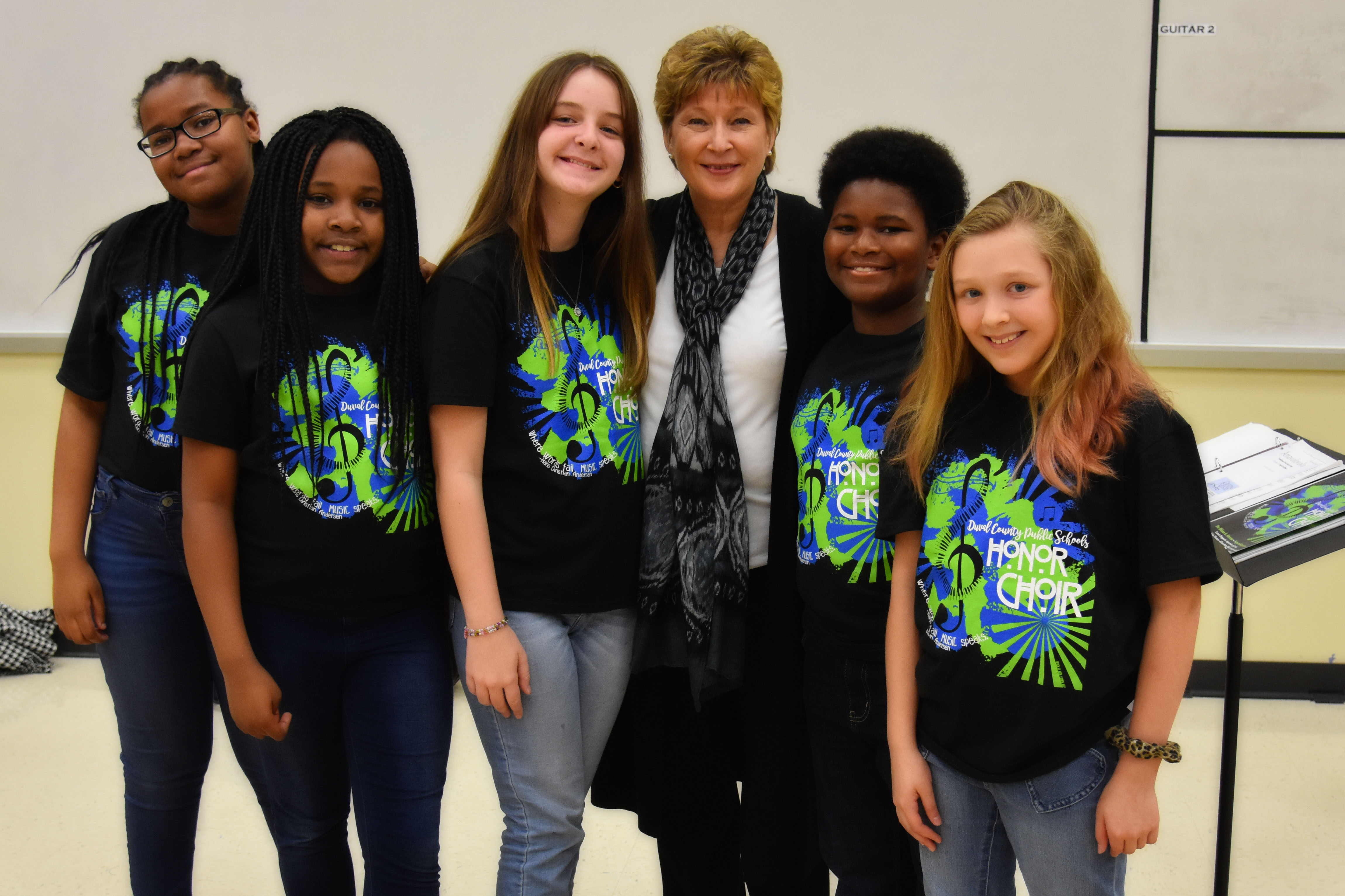 Duval County Public Schools Honor choir students posing with a teacher