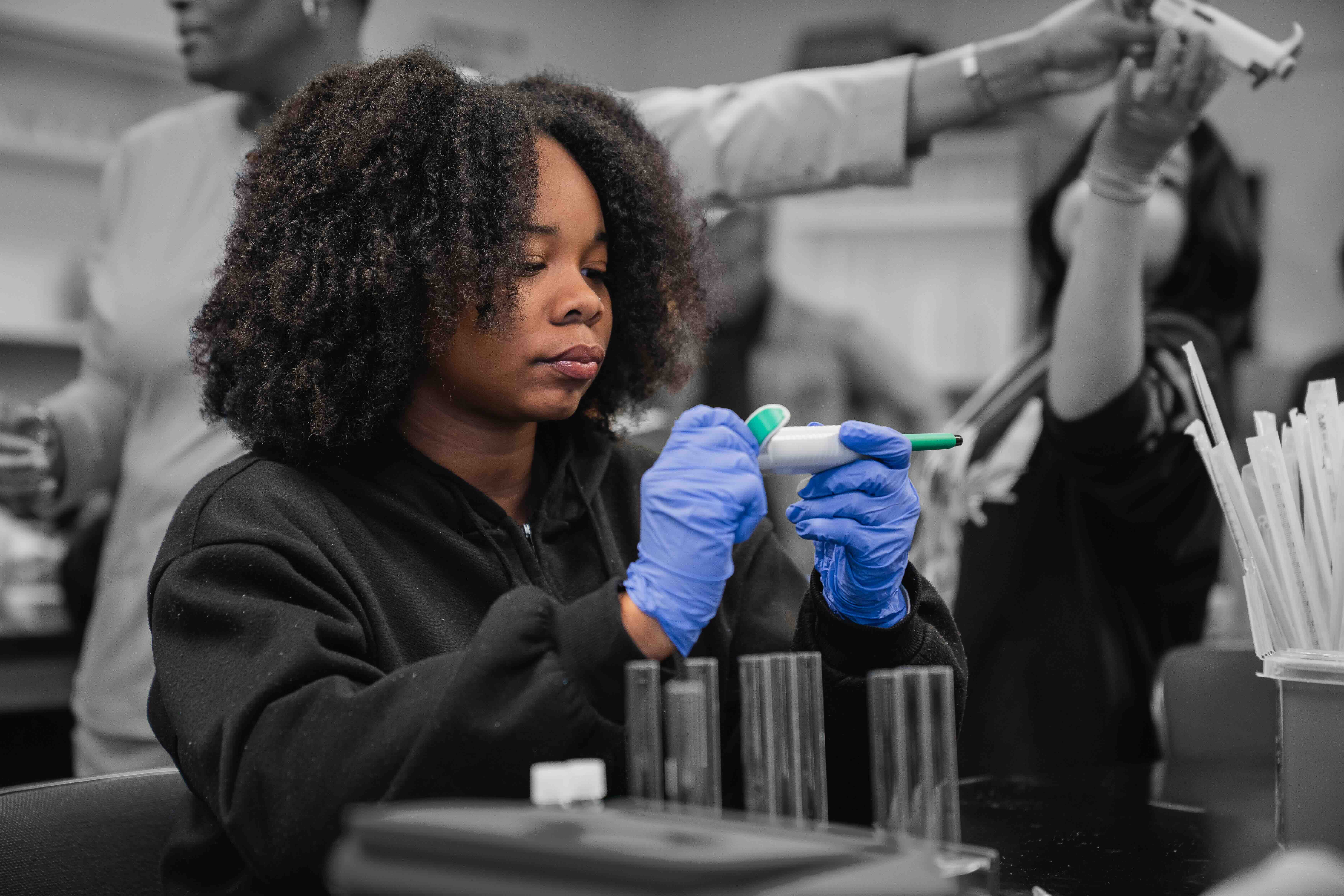 Student working with medical equipment