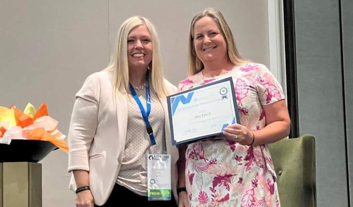 Teacher Amy Lynch presented with grant at state conference