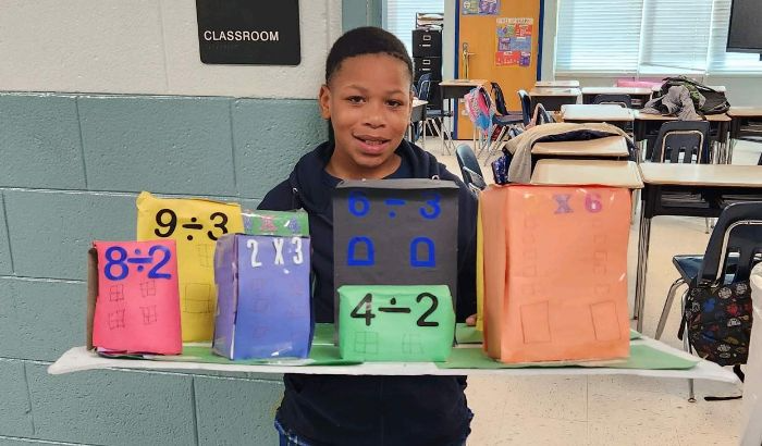 Student with math projects