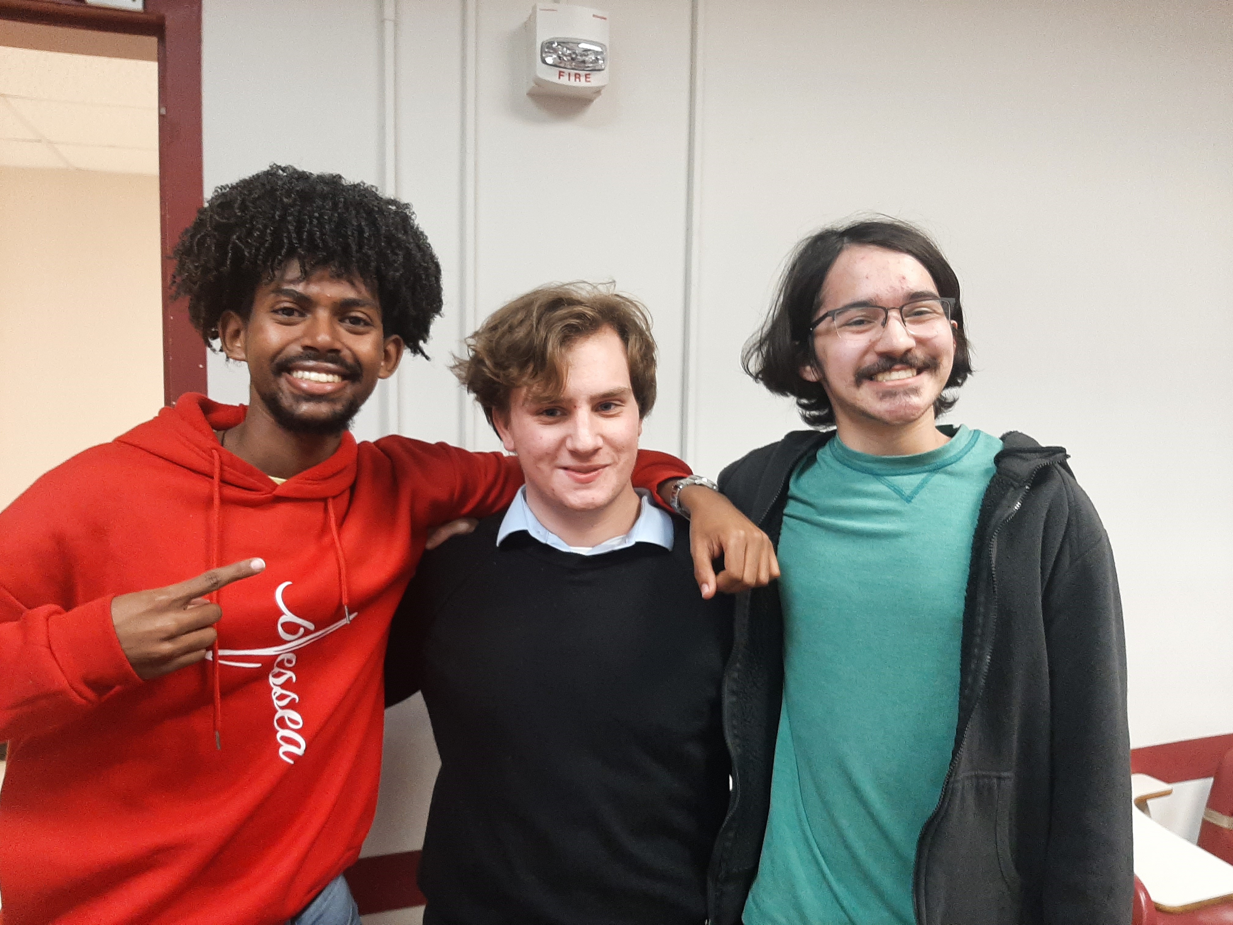 Darnell-Cookman Quiz Bowl Team winners Emmanuel Abay, Tyler McDonald, and Seth Van Deusen