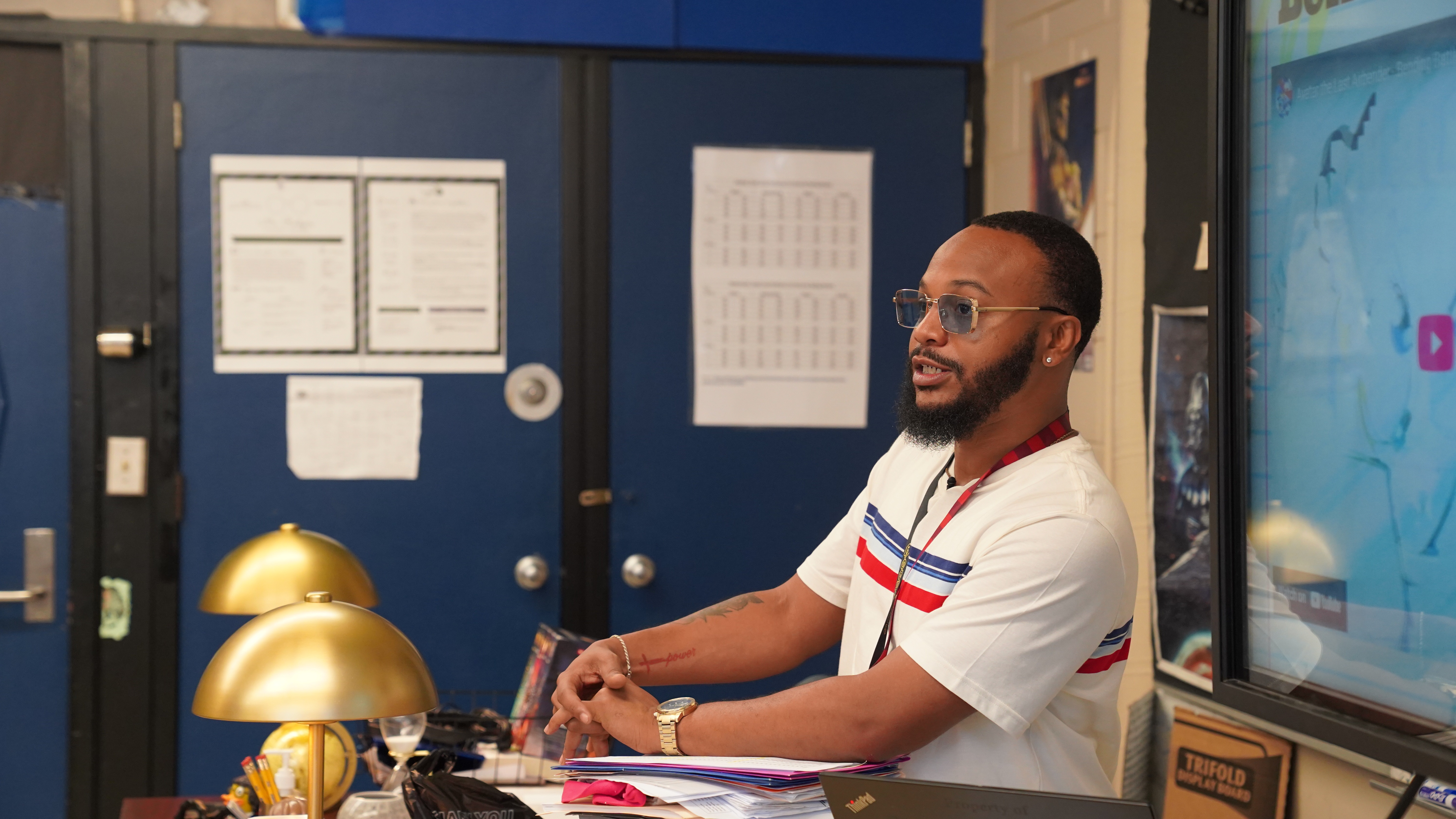 Terrance Rodgers teaches 8th-grade English Language Arts, engaging students in an interactive classroom.