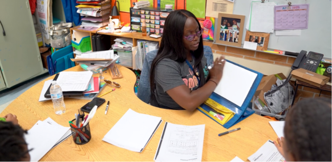 Dankeisha Ivester teaches at Normandy Village Elementary, guiding students through a classroom lesson with encouragement and enthusiasm.