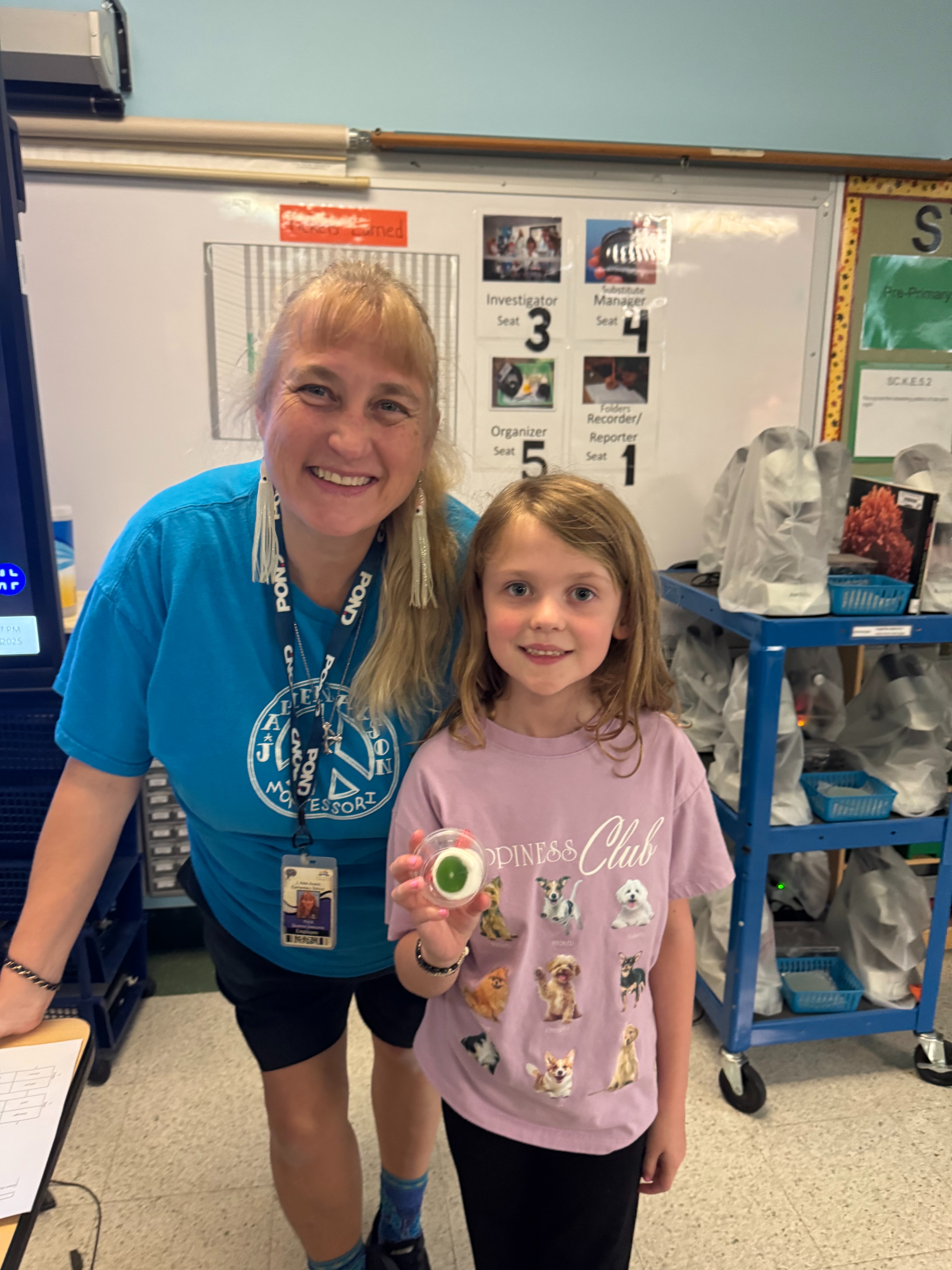 J. Allen Axson teacher Sandra Pond poses with a student