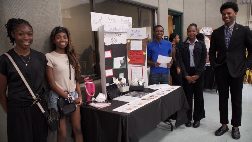 Students pose at African American Summer Writing Institute showcase