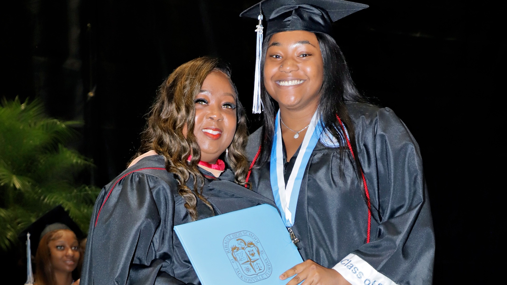 Jean Ribault High School Dean Sherrilla Simmons and graduate Layla Nelson