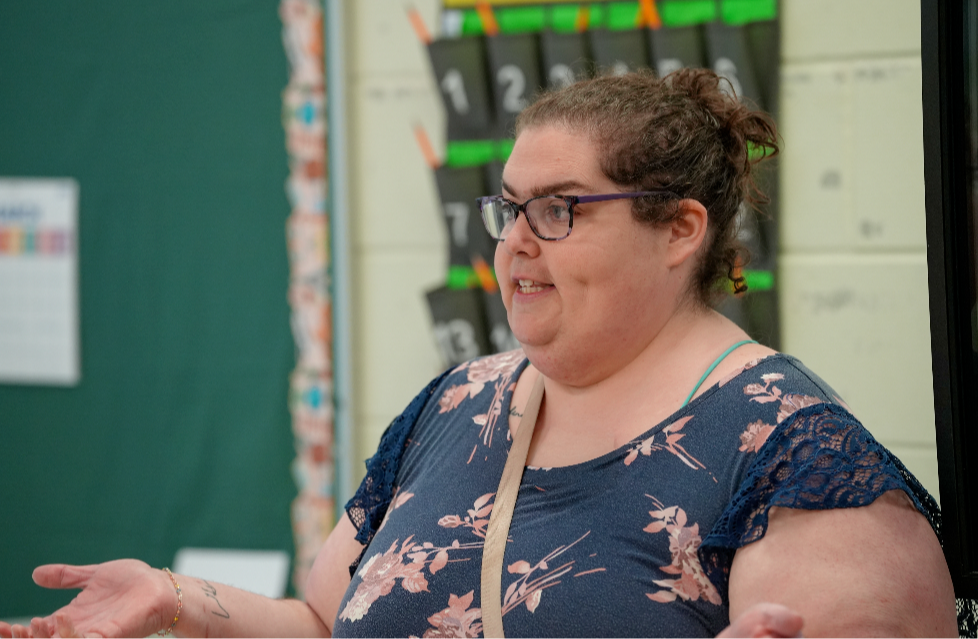 Kathleen “Katie” Sengstack, a teacher at Kernan Boulevard Middle School, works with students in her classroom.