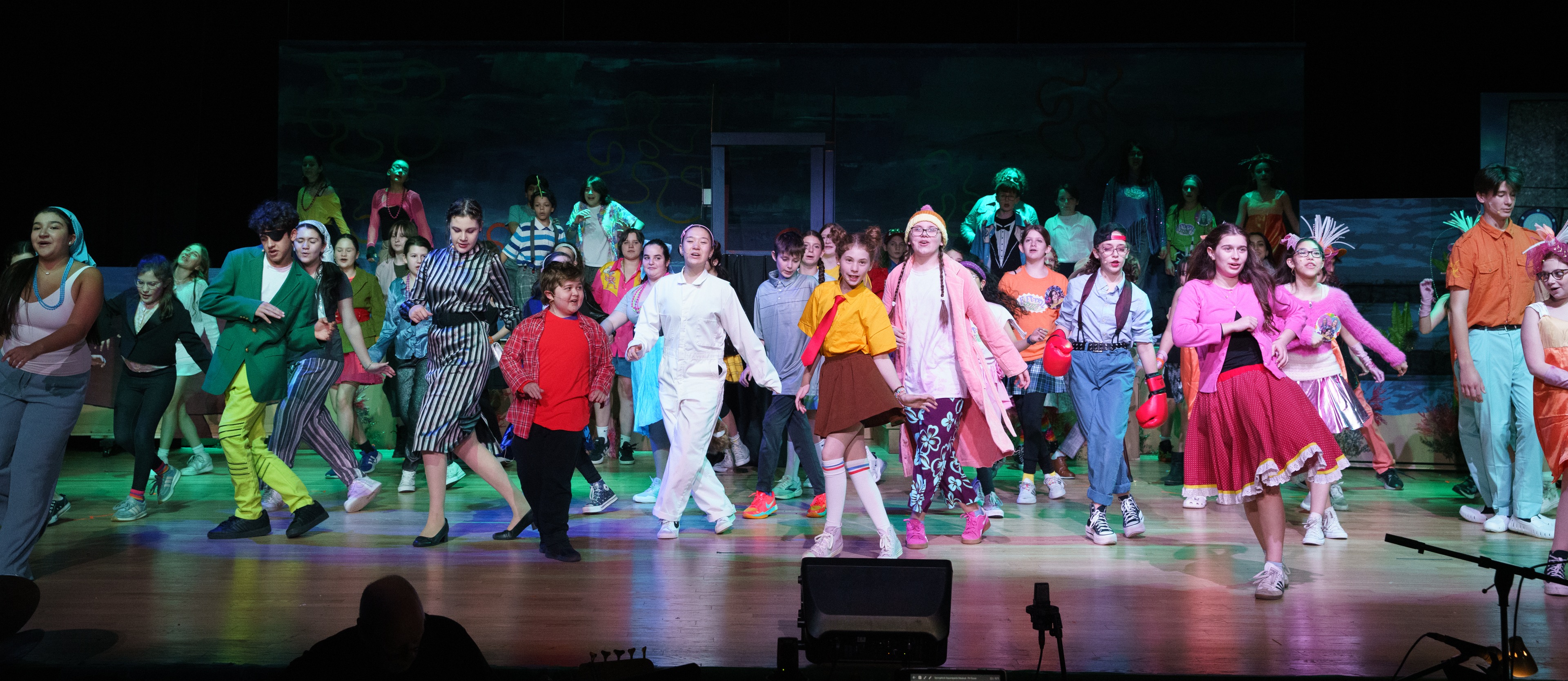 students dancing on stage