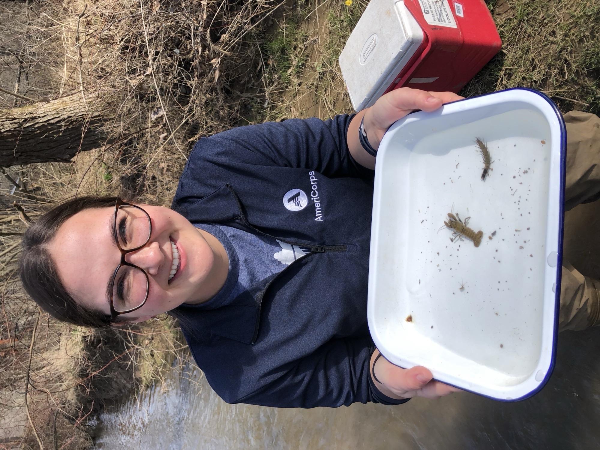 Allison with macroinvertebrates