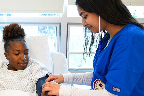 Nurses with patient