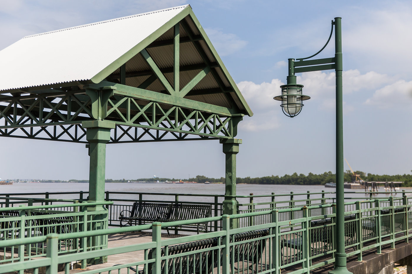 A gazebo sitting next to a body of water