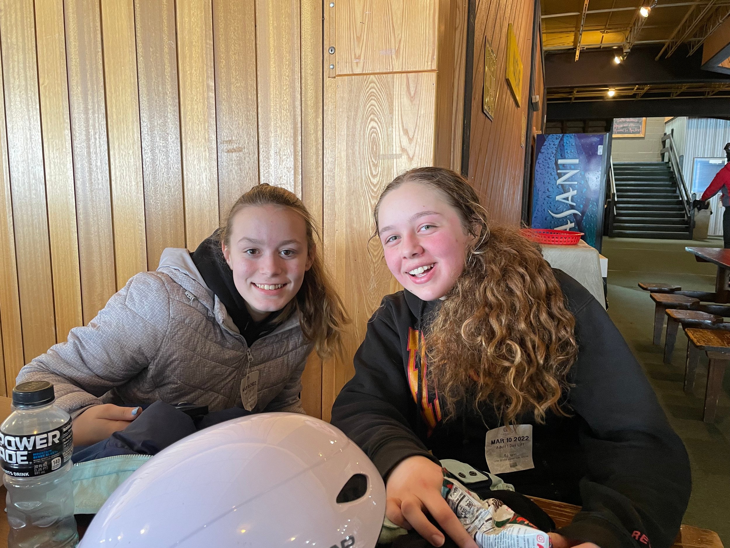 Two girls sitting at a table