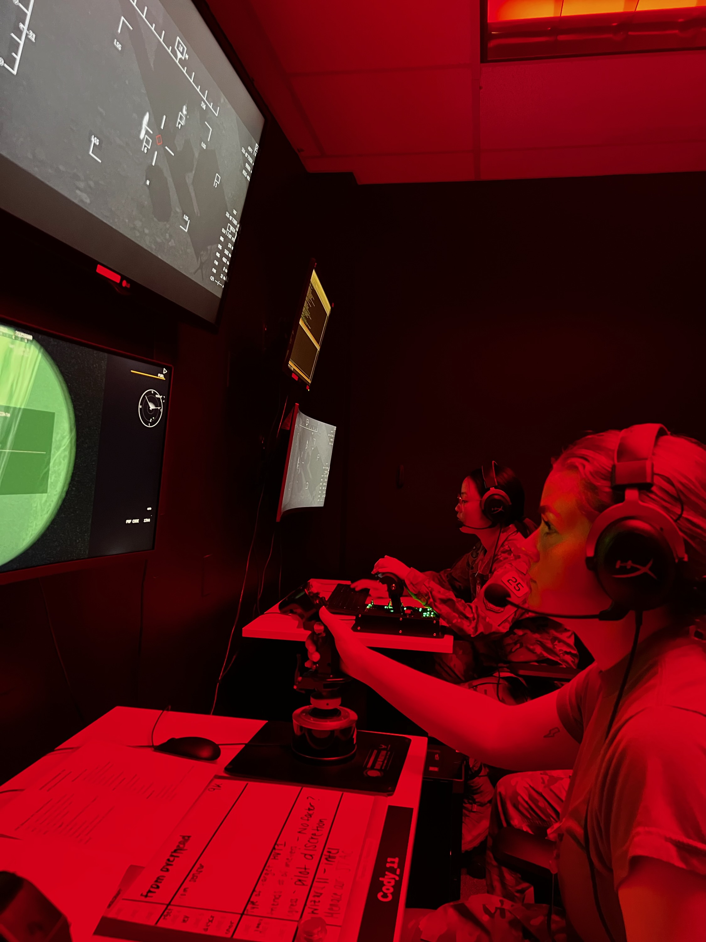 A woman engrossed in a video game on her computer, fully focused and immersed in the virtual world.