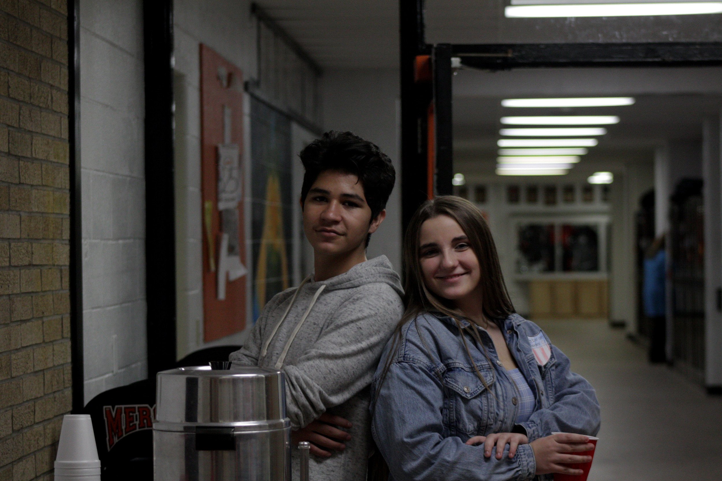 A man and a woman standing next to each other