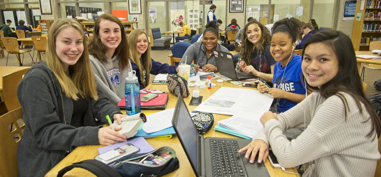 Students smiling to camera