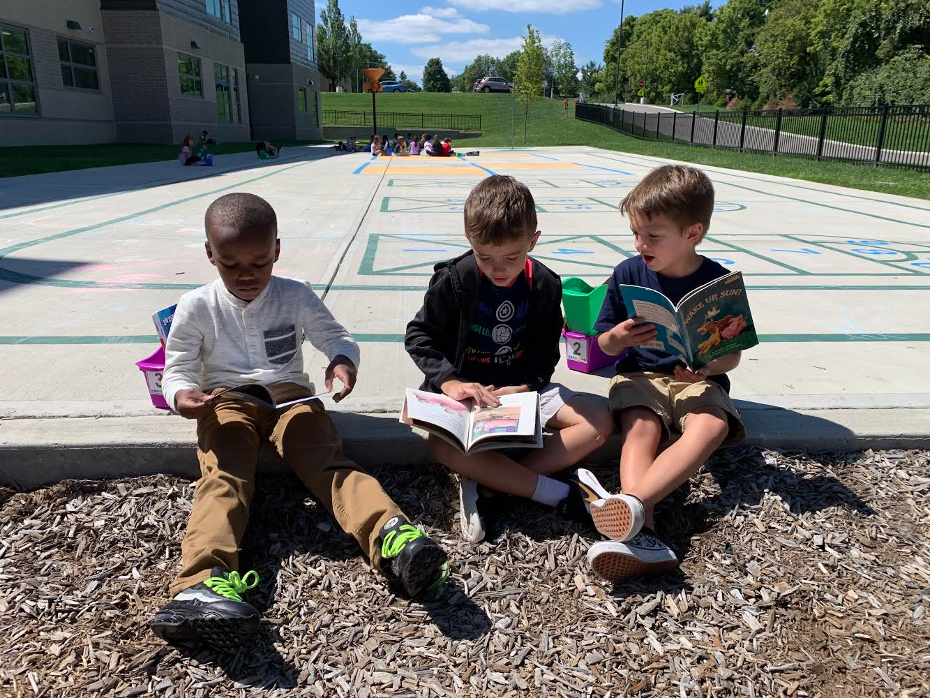 3 boys reading