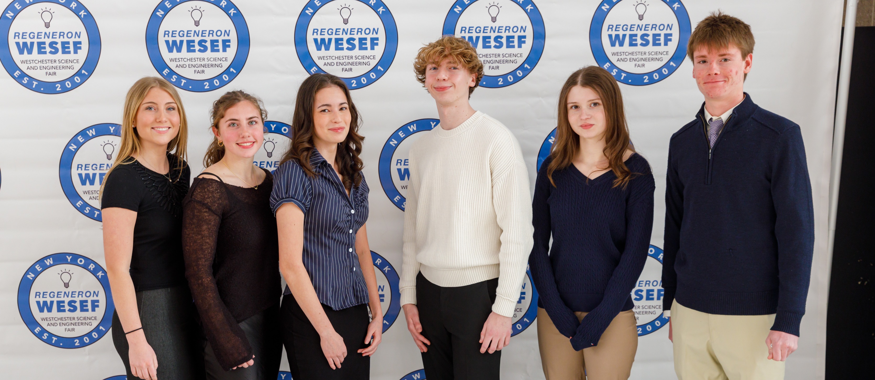 students gather for photo