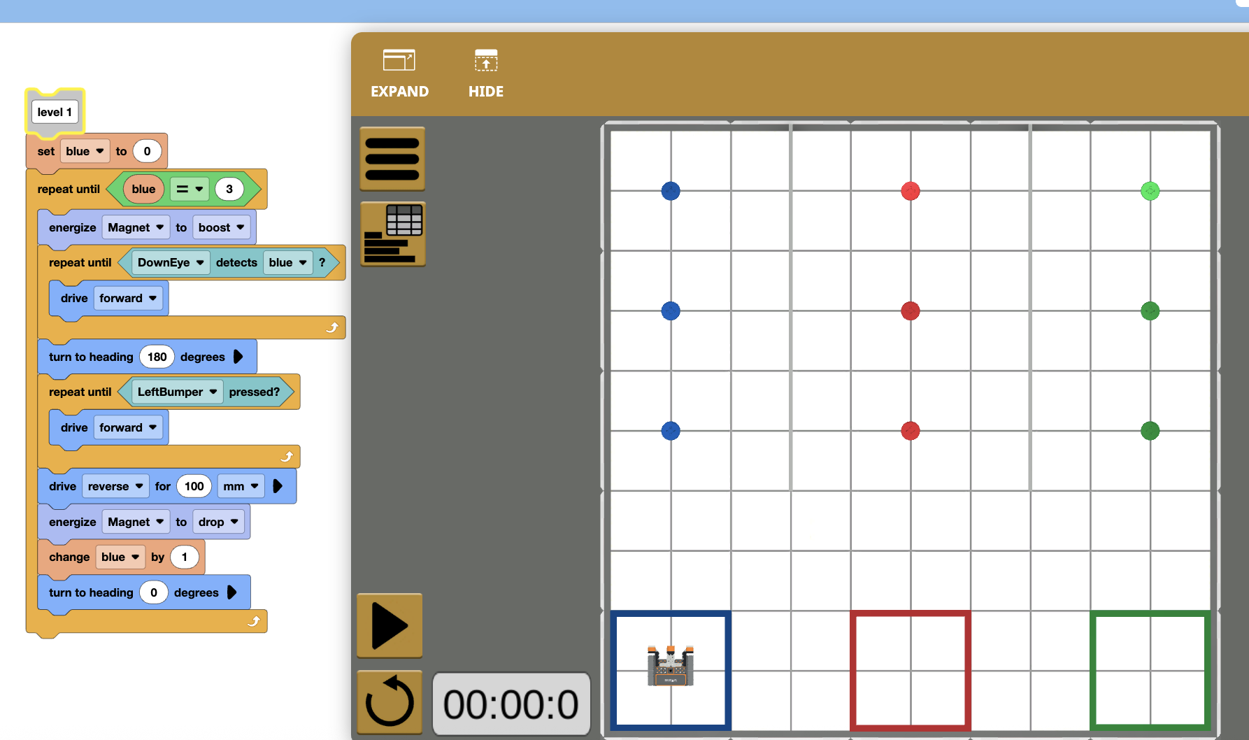 Students are learning how to code a virtual robot to perform simple tasks like picking up and moving small discs. 
