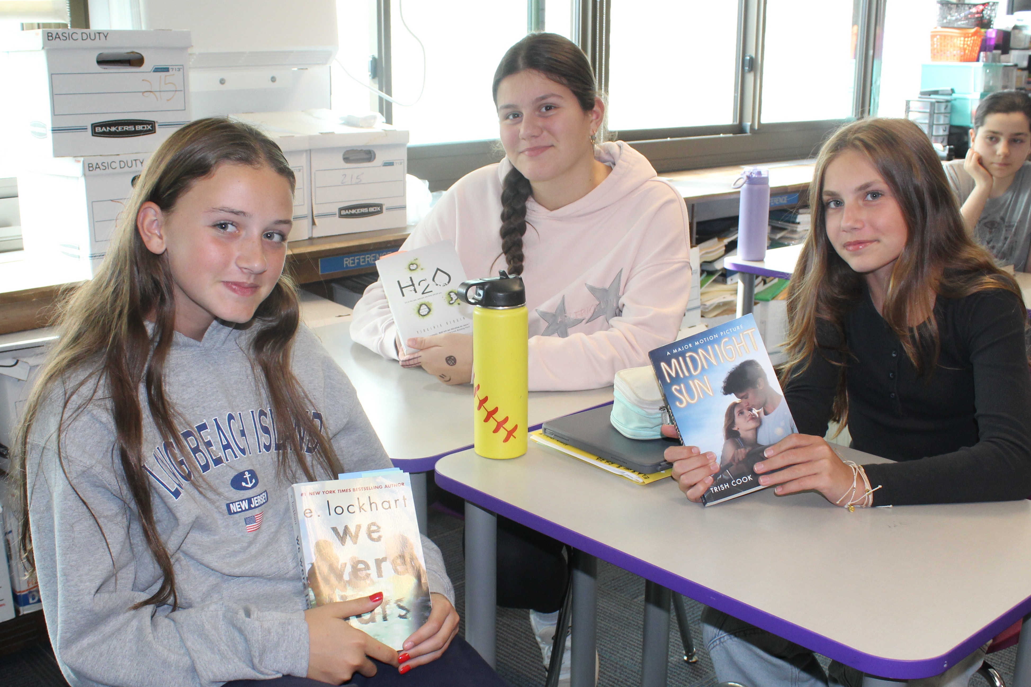 Team Charisma students in ELA with their IR books