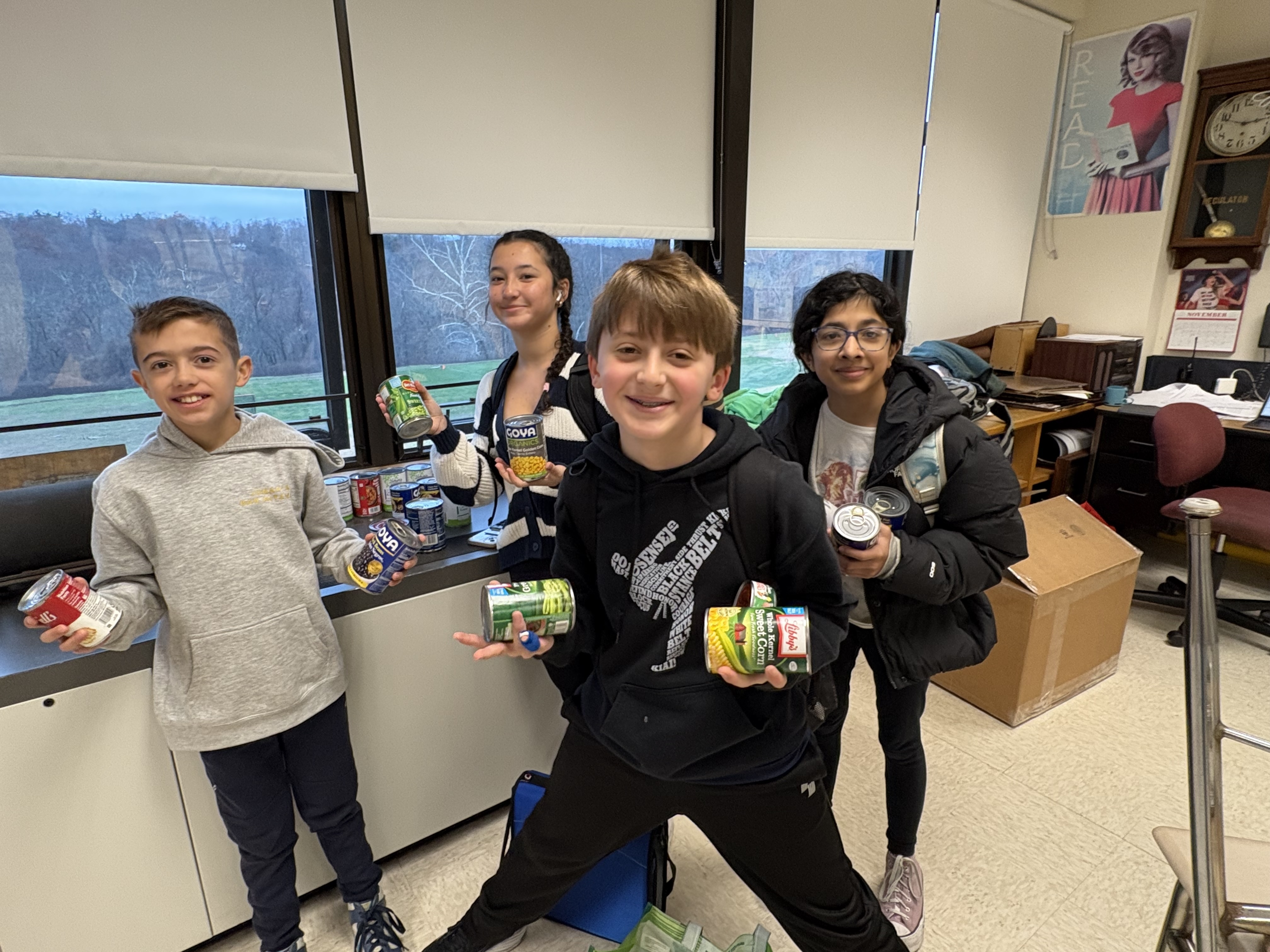 Team Tenancity Collects Cans for Holiday Food Drive!