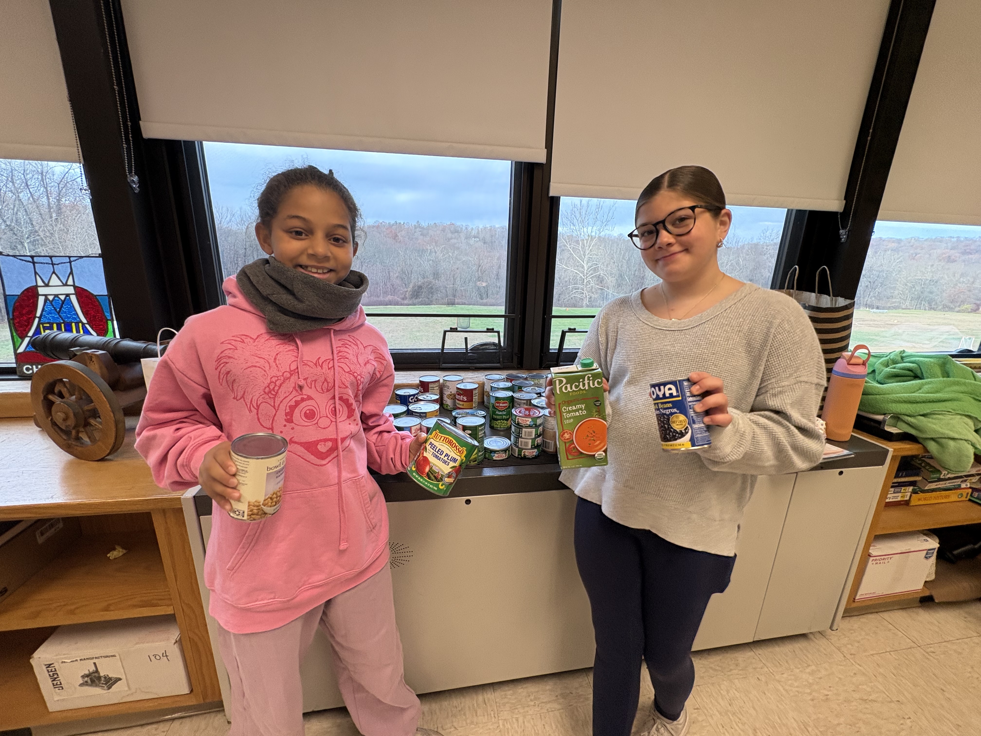 Team Tenancity Collects Cans for Holiday Food Drive!