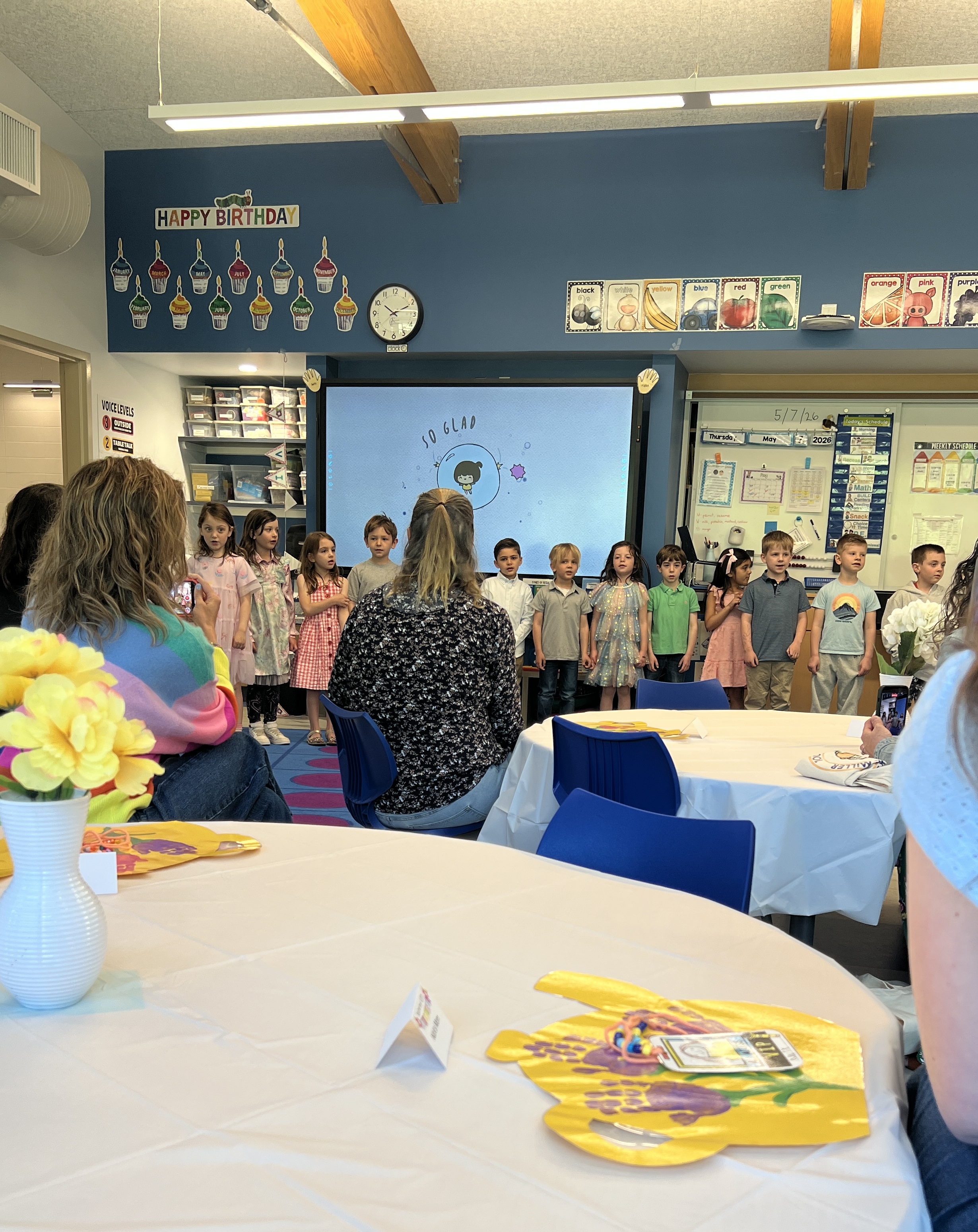 students standing in classroom