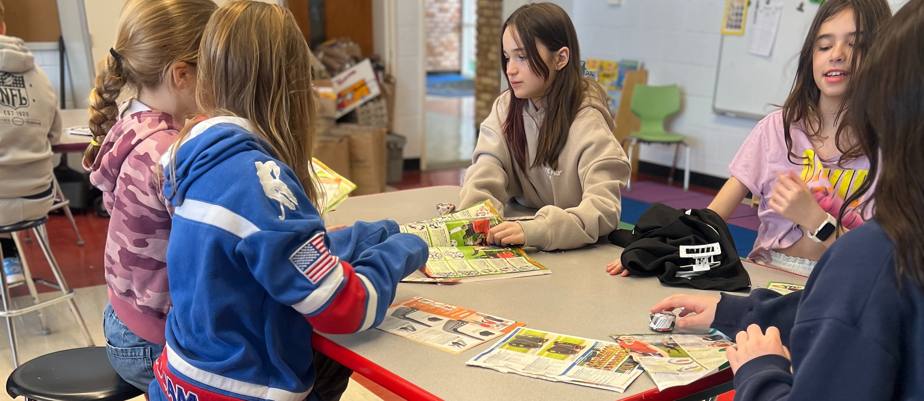 students standing making art