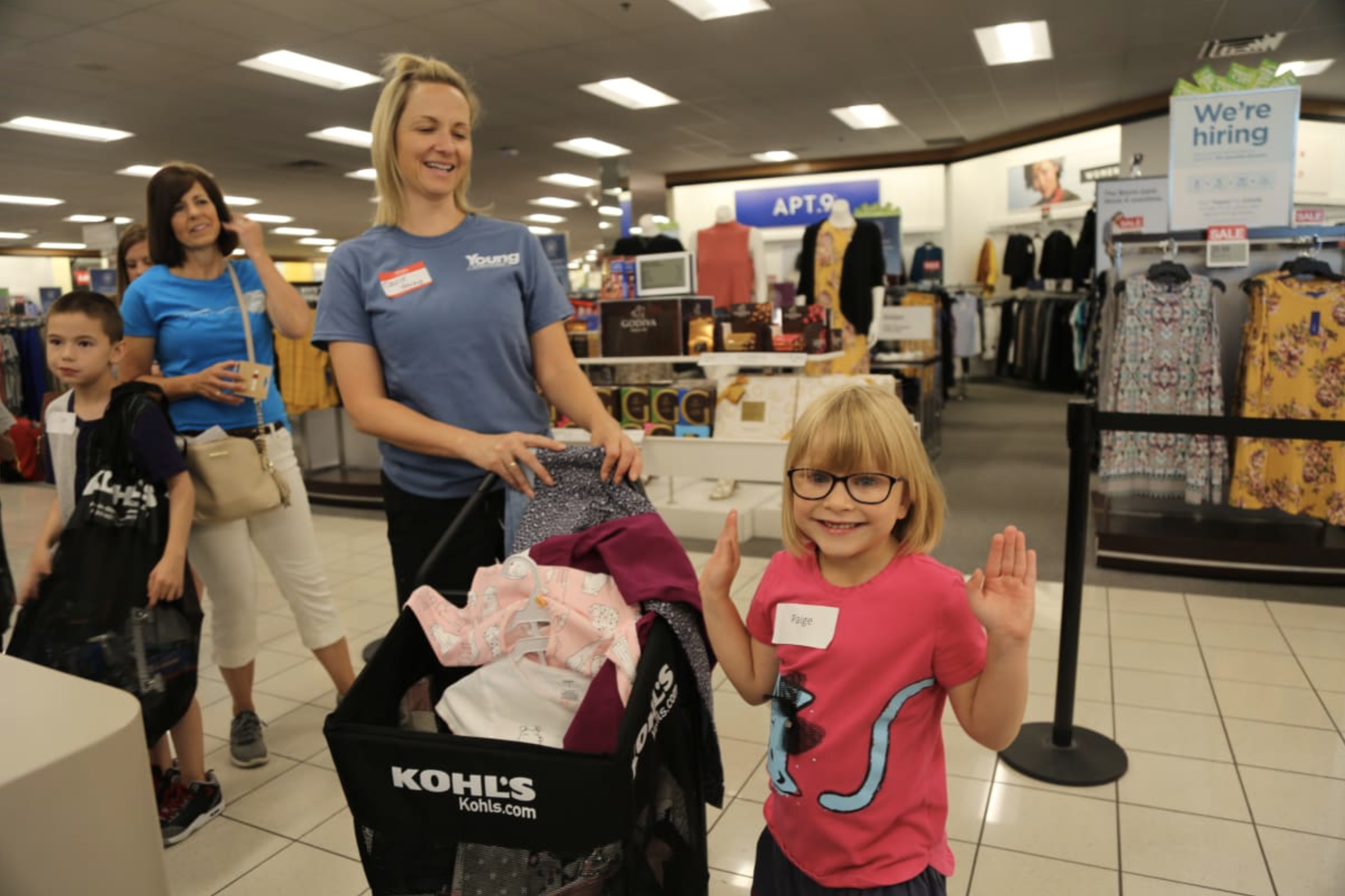 Shopping for child at department store