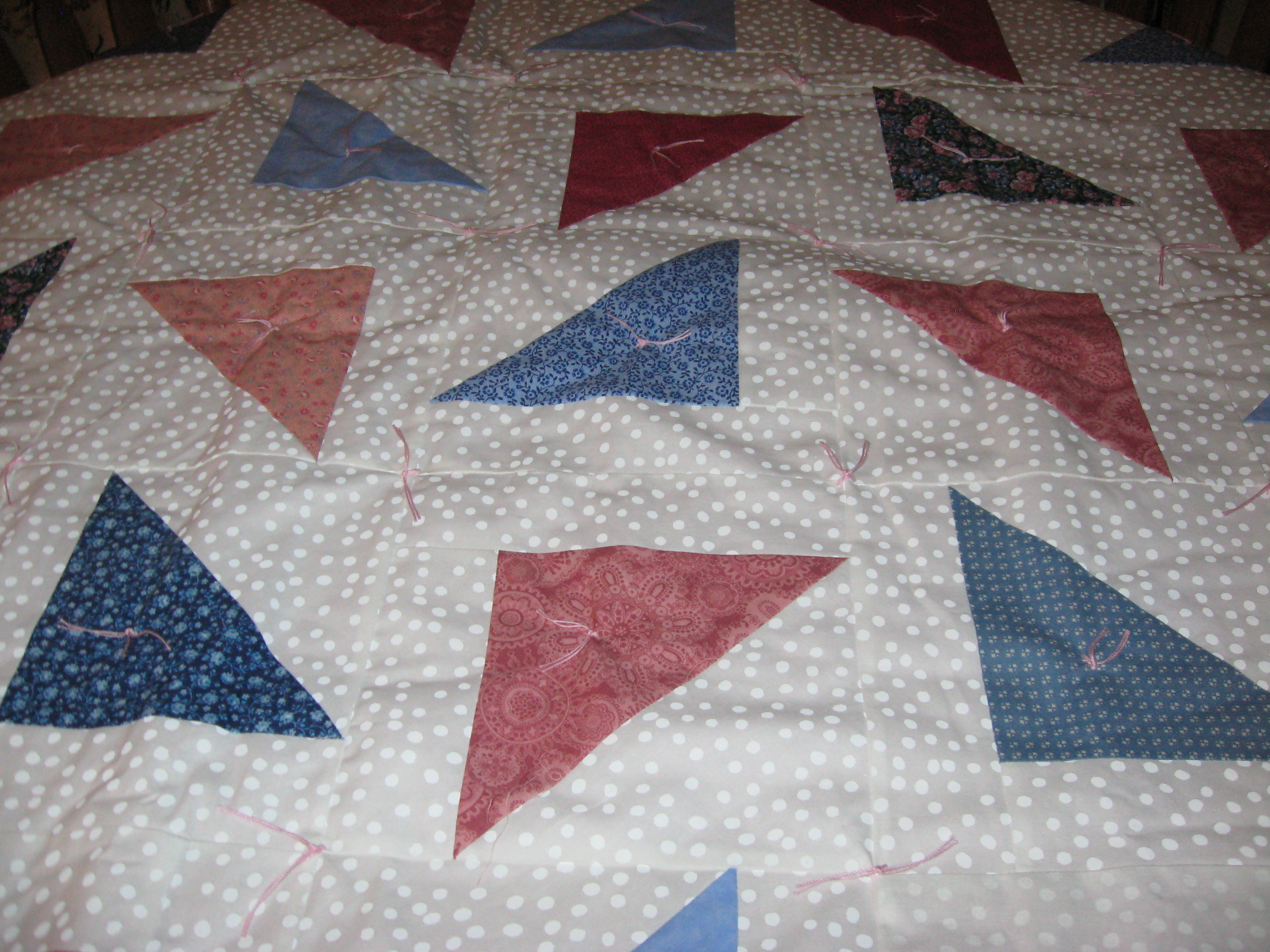 St Teresa of Avila in Akron - Quilters Group - pink, blue, and white Tringles