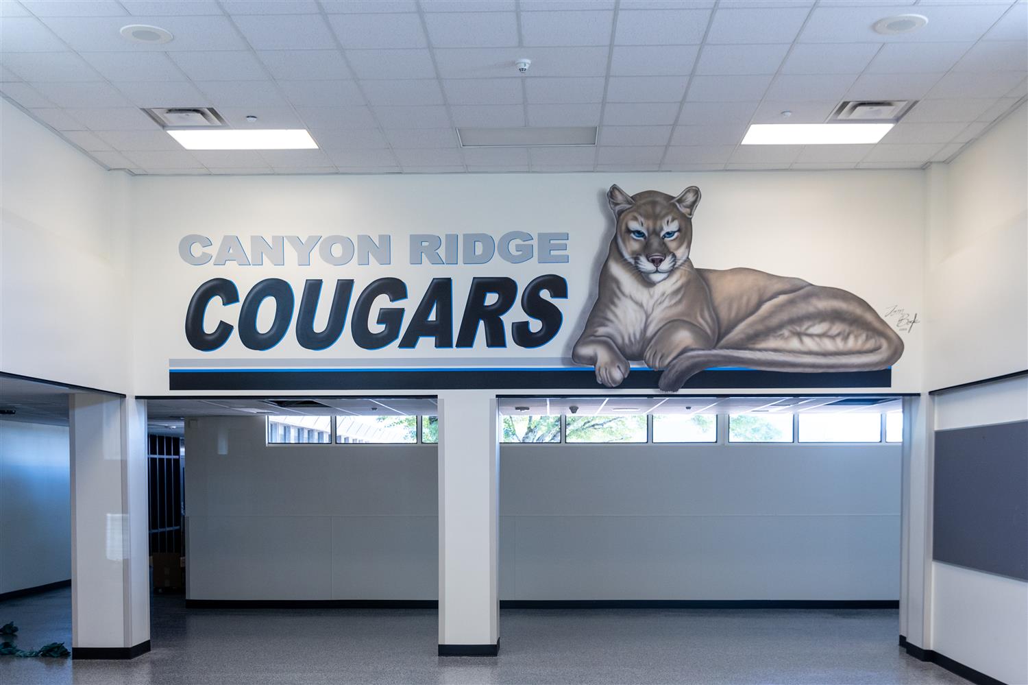 a mural that reads "Canyon Ridge Cougars"