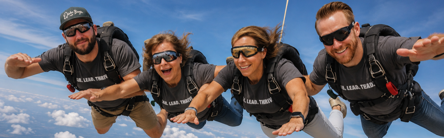 The admin team in an AI generated image of them skydiving.