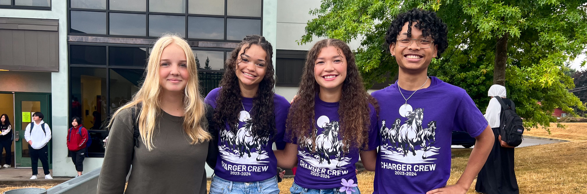 Four students smiling 