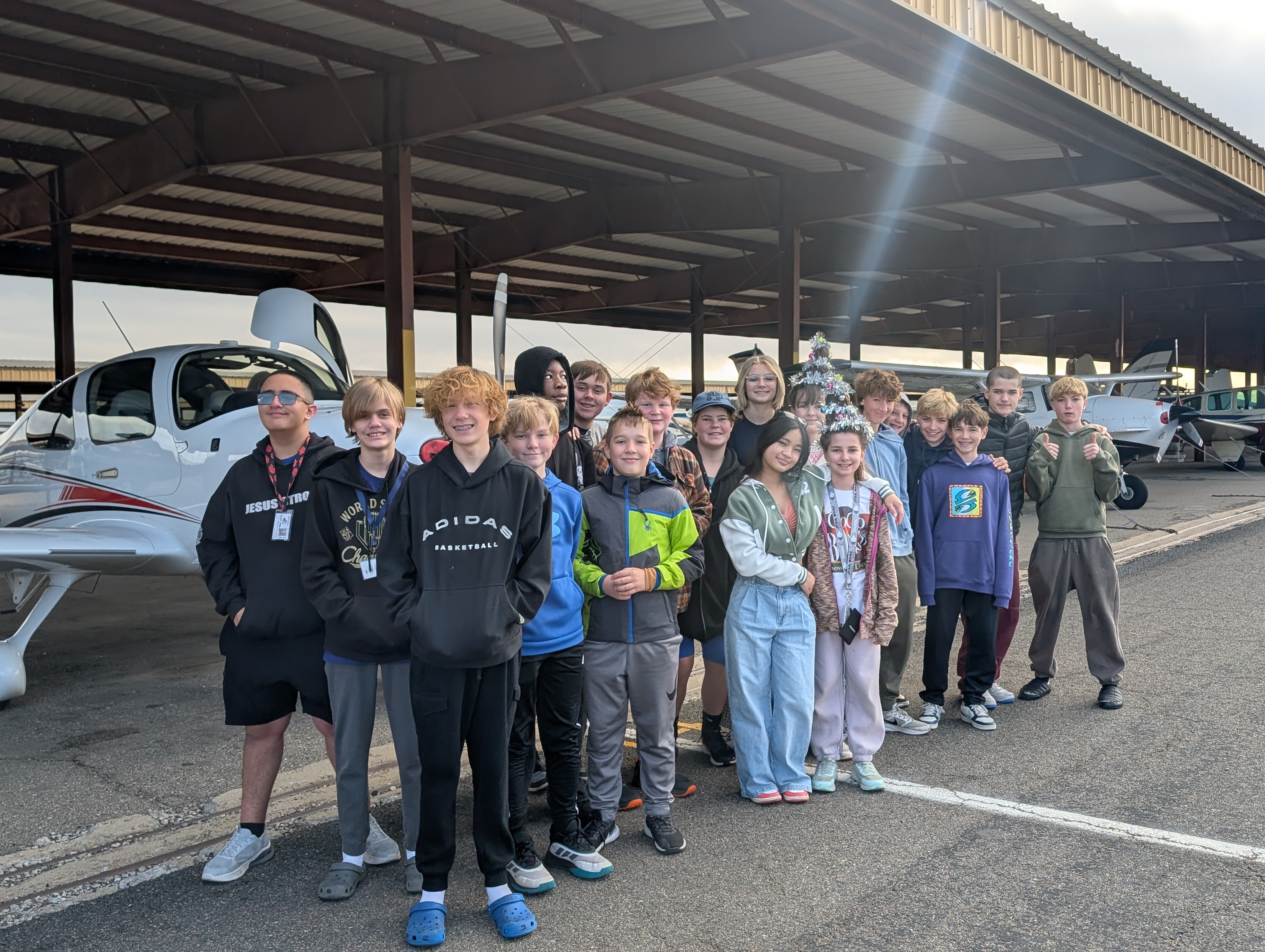 Students with airplanes